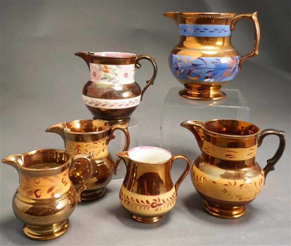 SIX COPPER LUSTRE CREAMERS/MILK JUGSSix