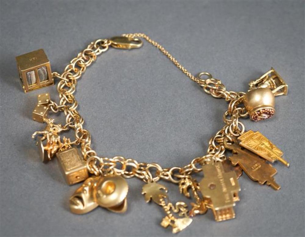 14 KARAT YELLOW GOLD CHARM BRACELET 3241c4