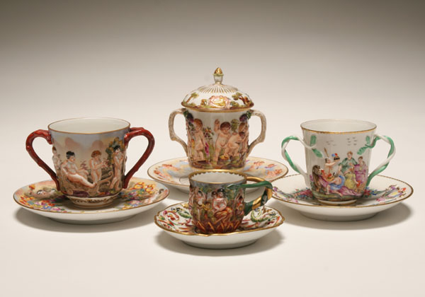 Four Capo di Monte figural cups and