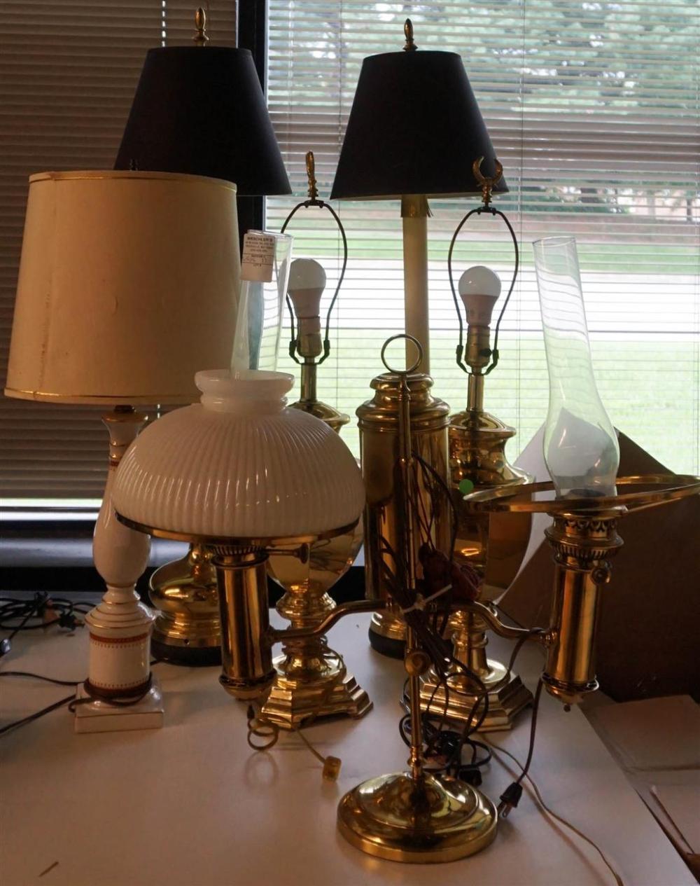 FIVE BRASS AND ONE PORCELAIN LAMPS,