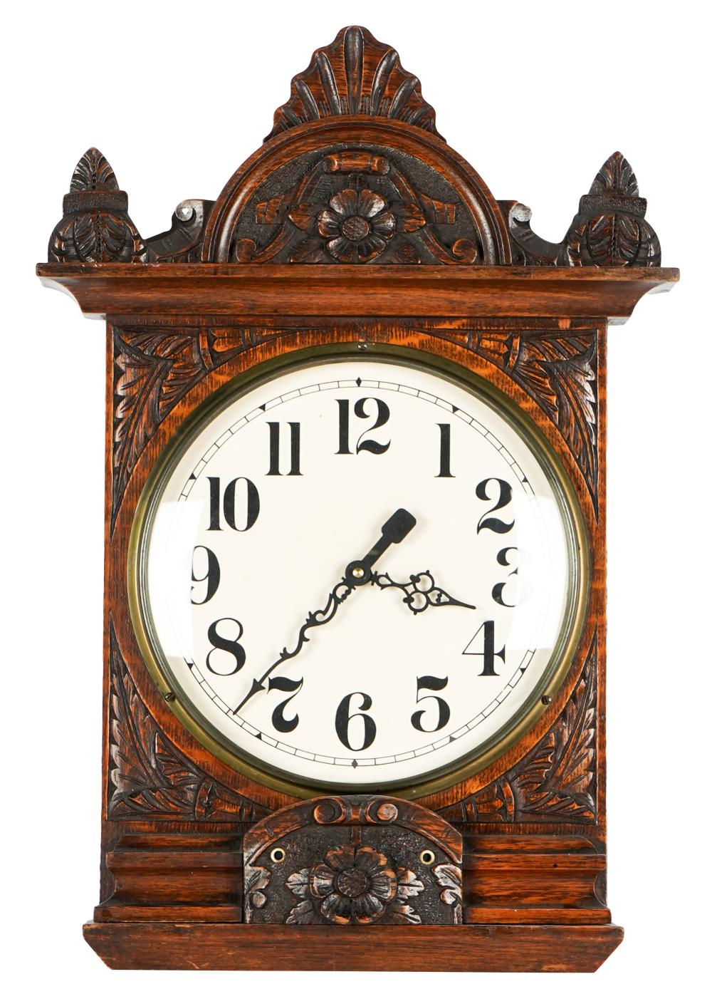 CARVED OAK WALL CLOCKwith later
