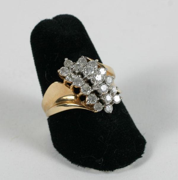 10K gold diamond dinner ring. Size