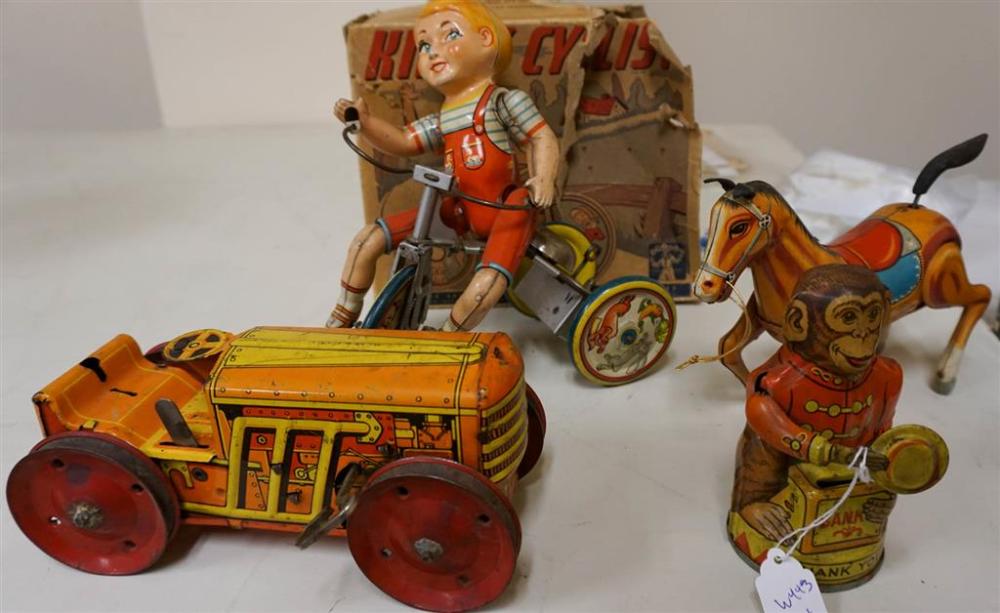 KIDDY CYCLIST TIN TOY AND THREE