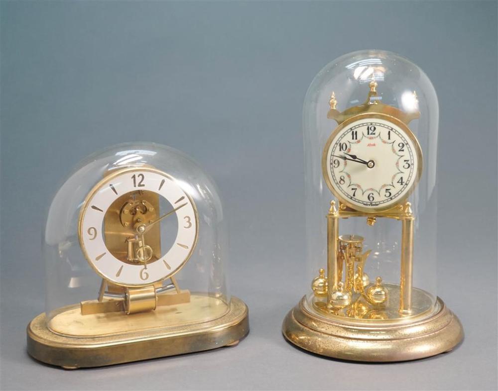 TWO BRASS CLOCKS WITH GLASS DOMESTwo 327af7