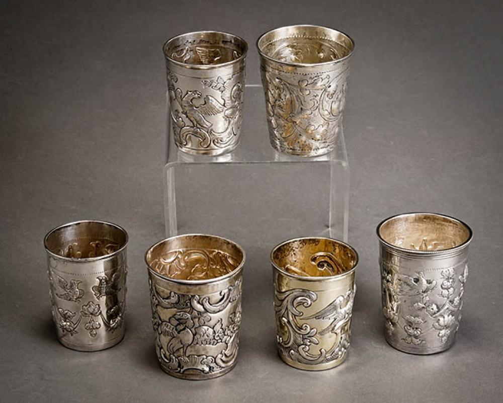 SIX RUSSIAN EMBOSSED SILVER BEAKERS  327b7c