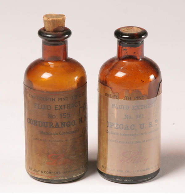 Lilly medicine bottles; 1/4 pint and