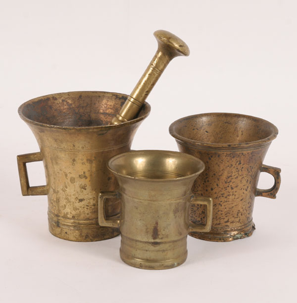 Early brass double handle mortars