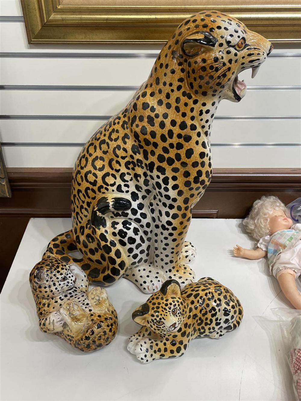 THREE CERAMIC FIGURES OF CHEETAHSThree 32802b