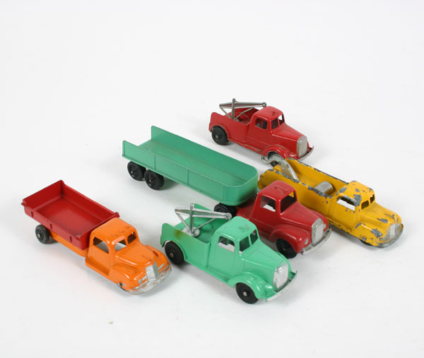 Tootsie Toy trucks; three wreckers,