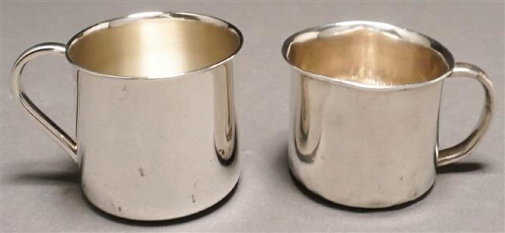 TWO STERLING SILVER BABY MUGS  325ddb