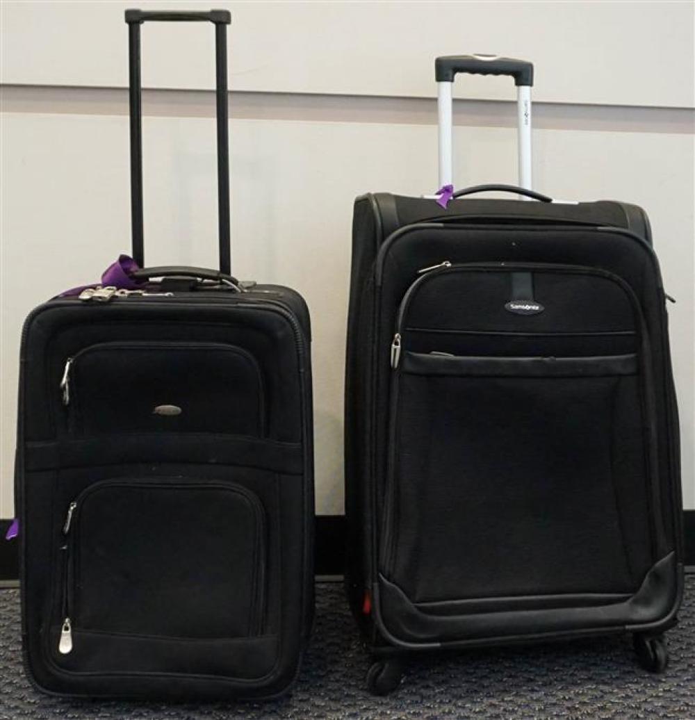 TWO BLACK VINYL ROLLING SUITCASESTwo 325e89