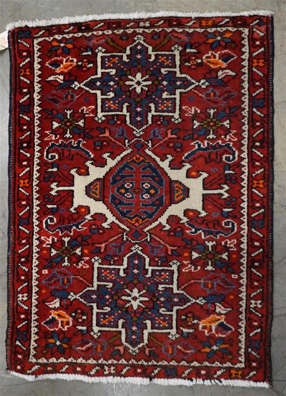 TABRIZ RUG AND A HERIZ RUG, LARGER: