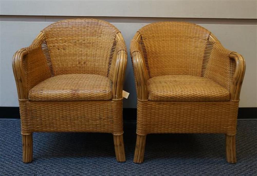 PAIR RATTAN AND WOVEN LEATHER ARMCHAIRSPair