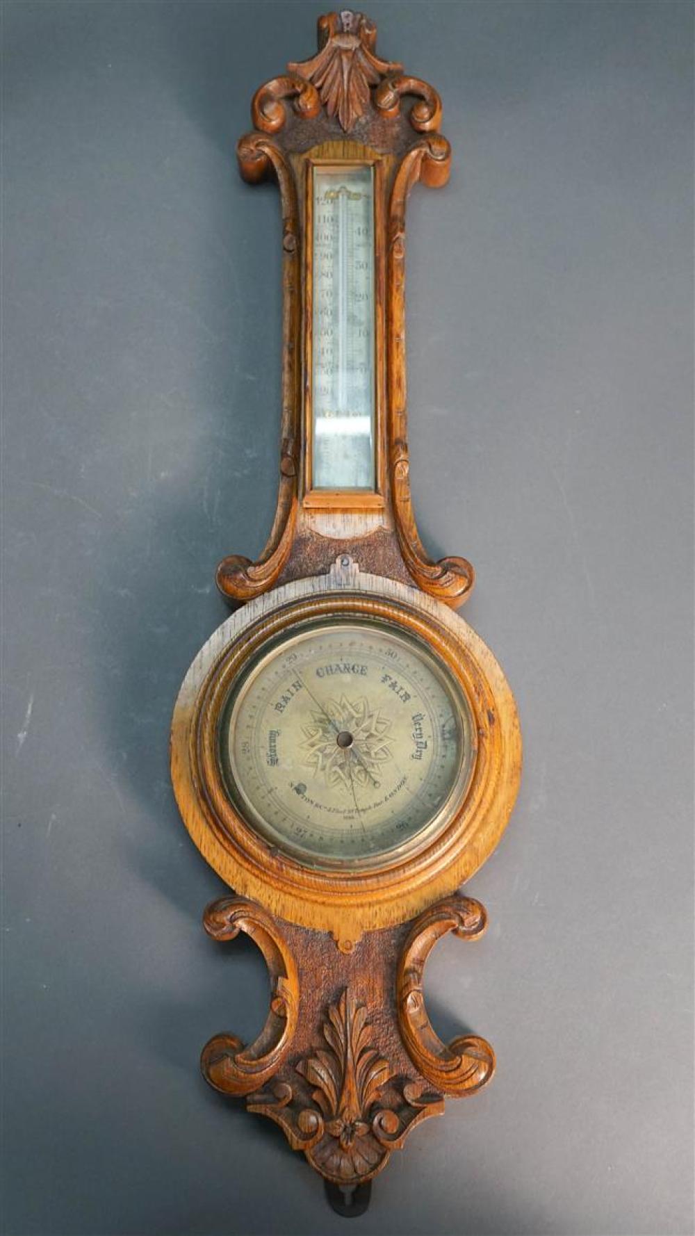 NEWTON CO CARVED OAK WALL BAROMETER  326152