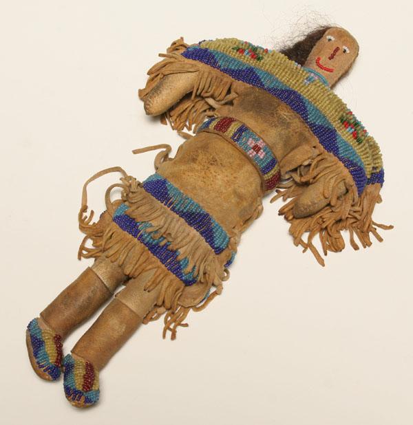 Native American toy; vintage buckskin