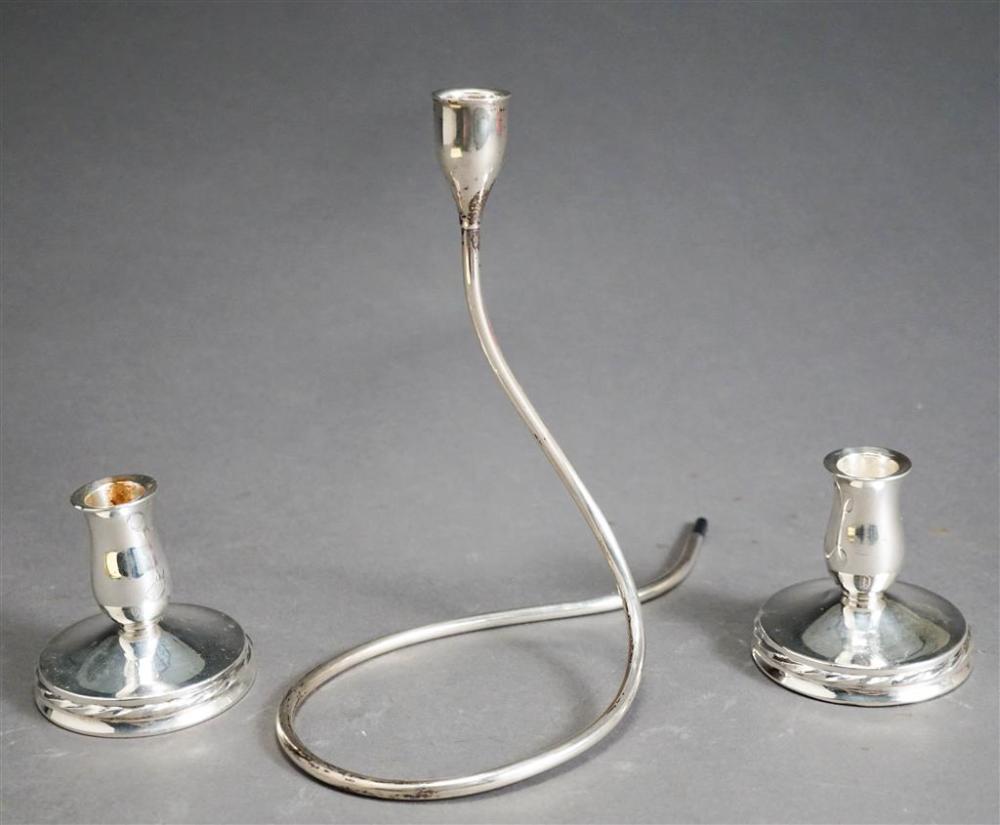 THREE STERLING WEIGHTED CANDLESTICKSThree