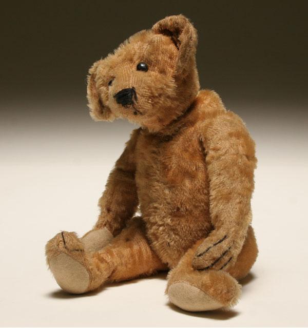 Four teddy bears; smal early jointed