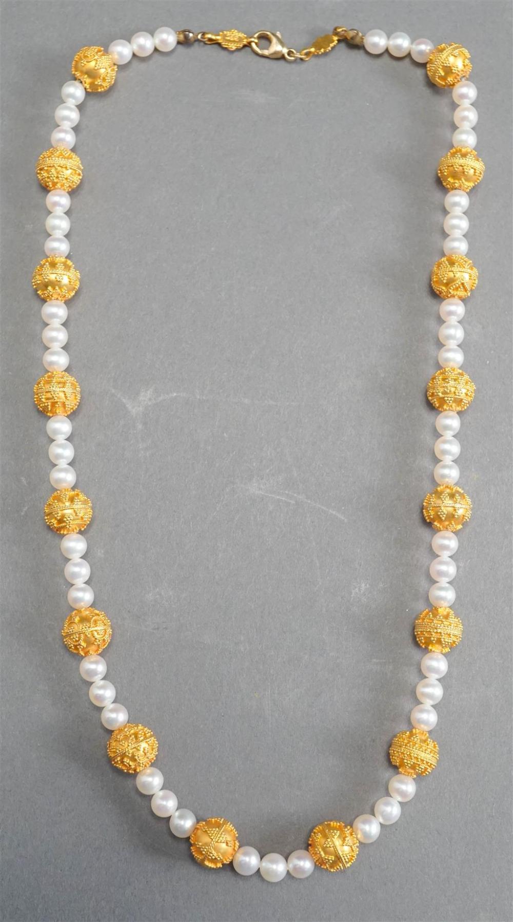 23 KARAT YELLOW GOLD AND PEARL 32928a