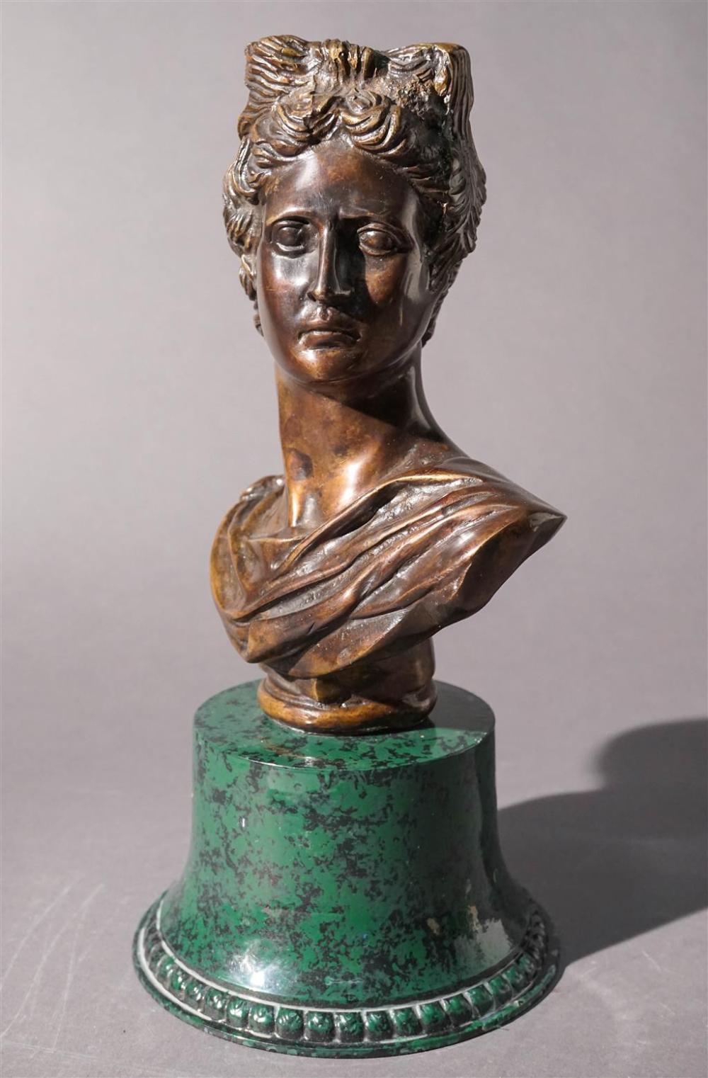 BRONZE BUST OF A WOMAN ON A FAUX MARBLE