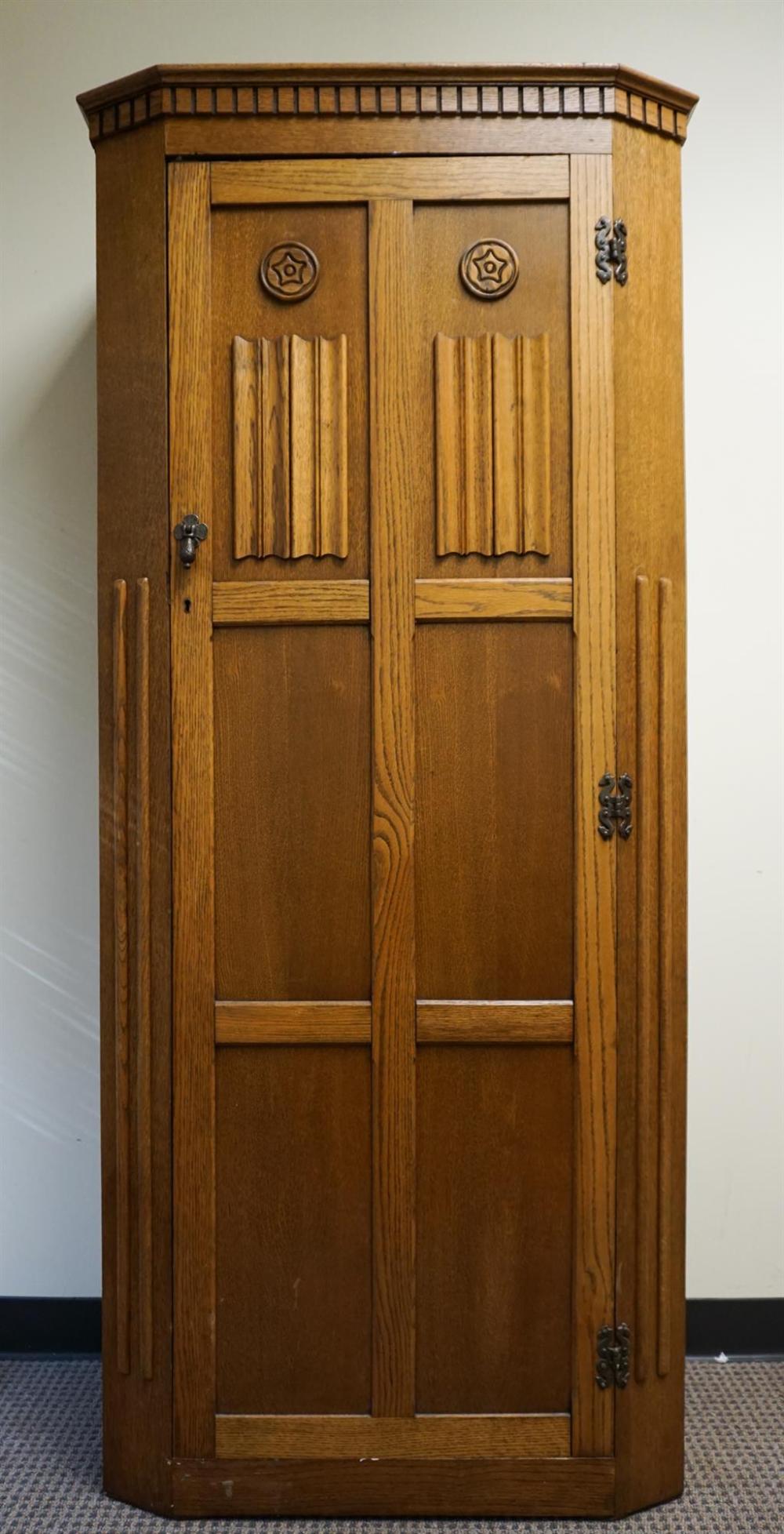 JACOBEAN STYLE OAK SINGLE-DOOR