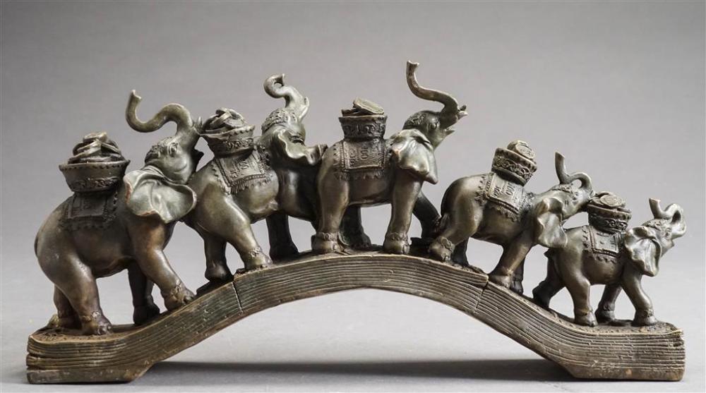 BRONZE FIGURAL GROUP OF AN ELEPHANT