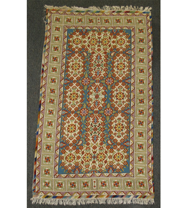 Vibrant floral woven tapestry rug