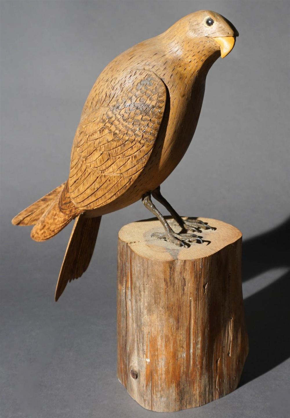 CARVED WOOD FIGURE OF A HAWK ON TREE