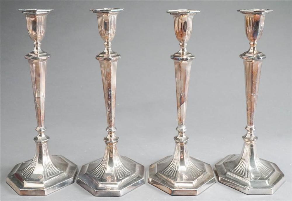 SET OF FOUR SILVER PLATE CANDLESTICKS,