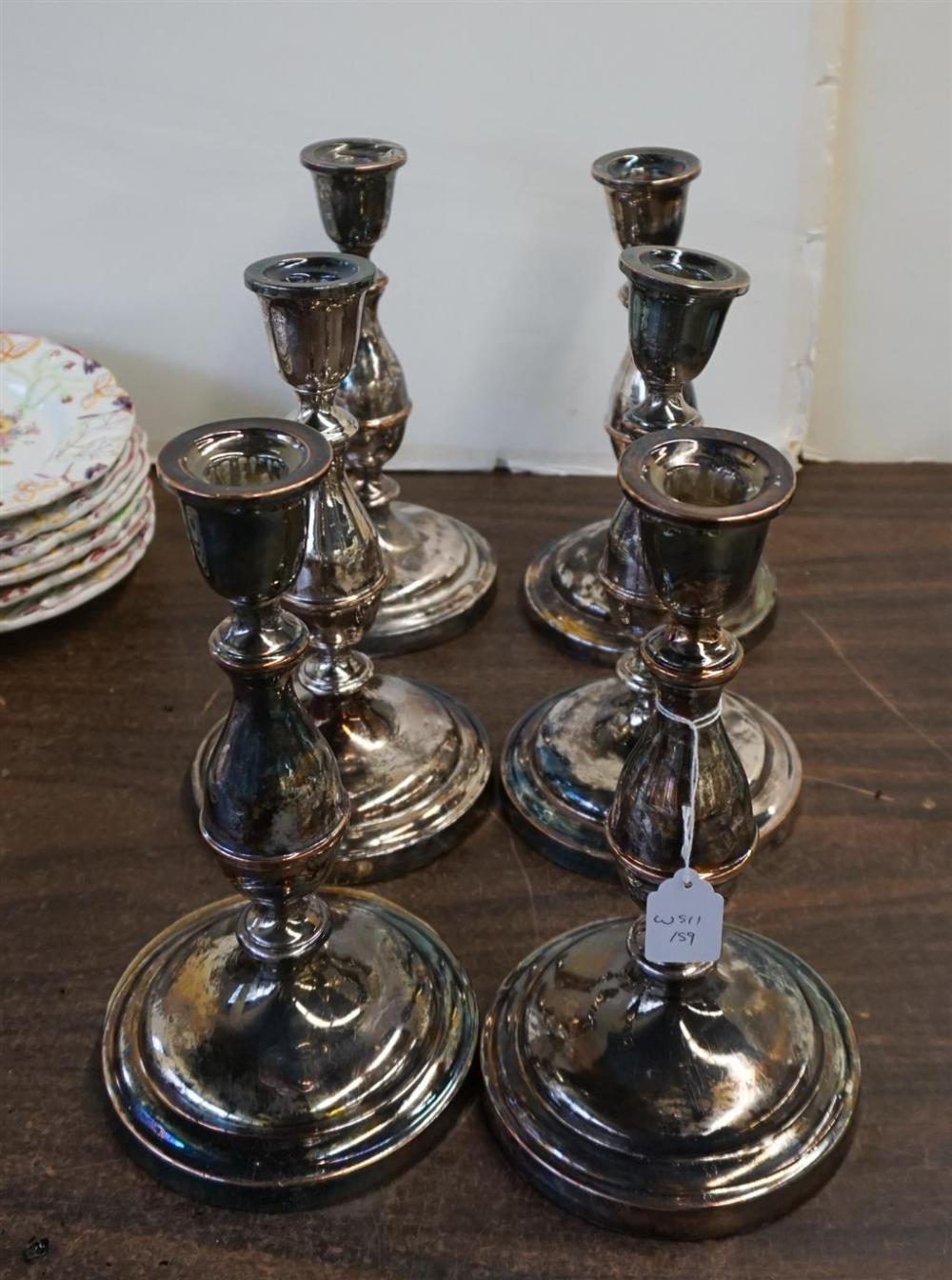 SIX ENGLISH SILVER PLATE CANDLESTICKS  329a27