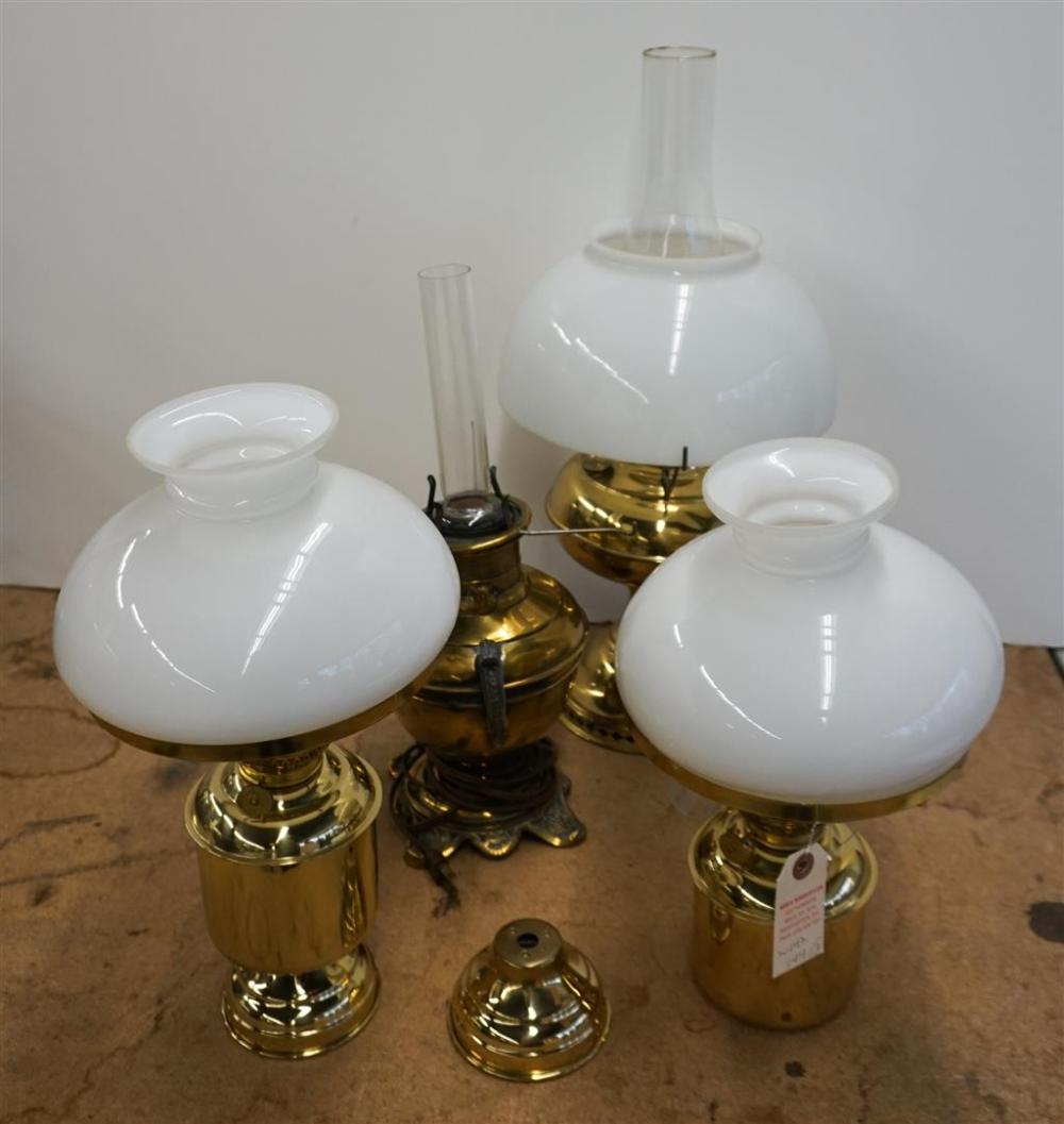 FOUR BRASS OIL LAMPS WITH THREE 329a38