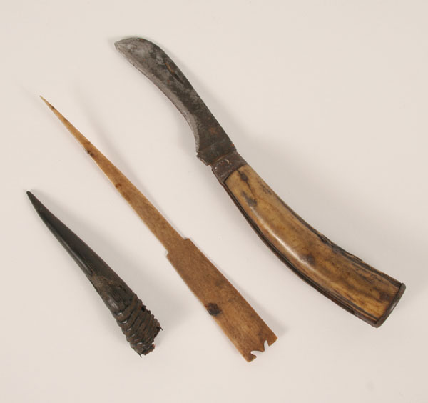 Horn handled knife, bone awl, and horn.