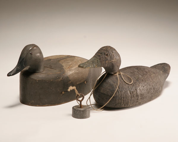Two vintage hand carved duck decoys;