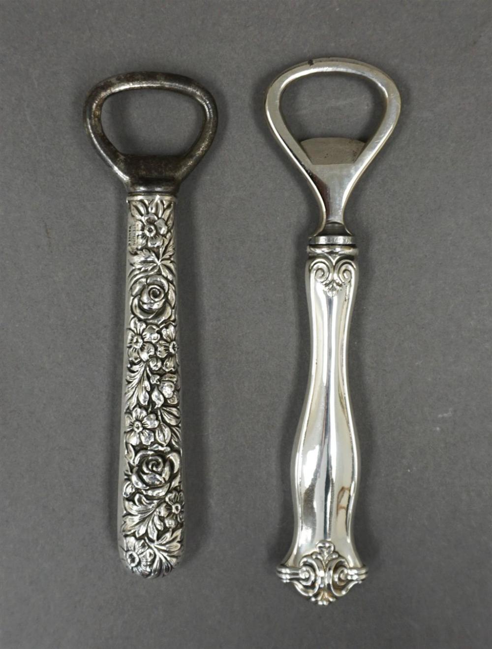 TWO STERLING SILVER HANDLED BOTTLE