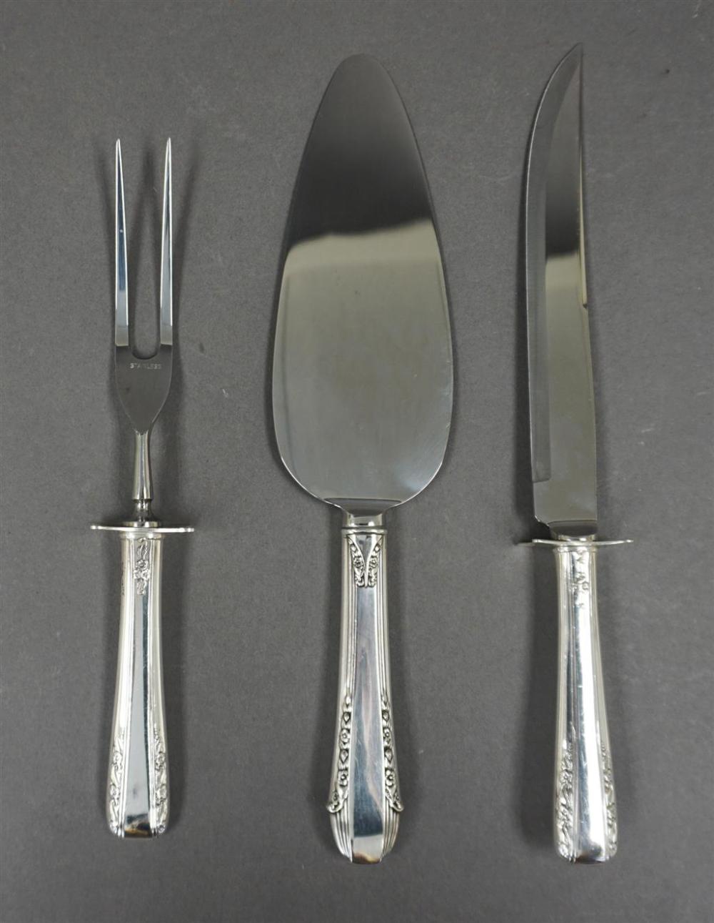 THREE STERLING SILVER HANDLED FLAT