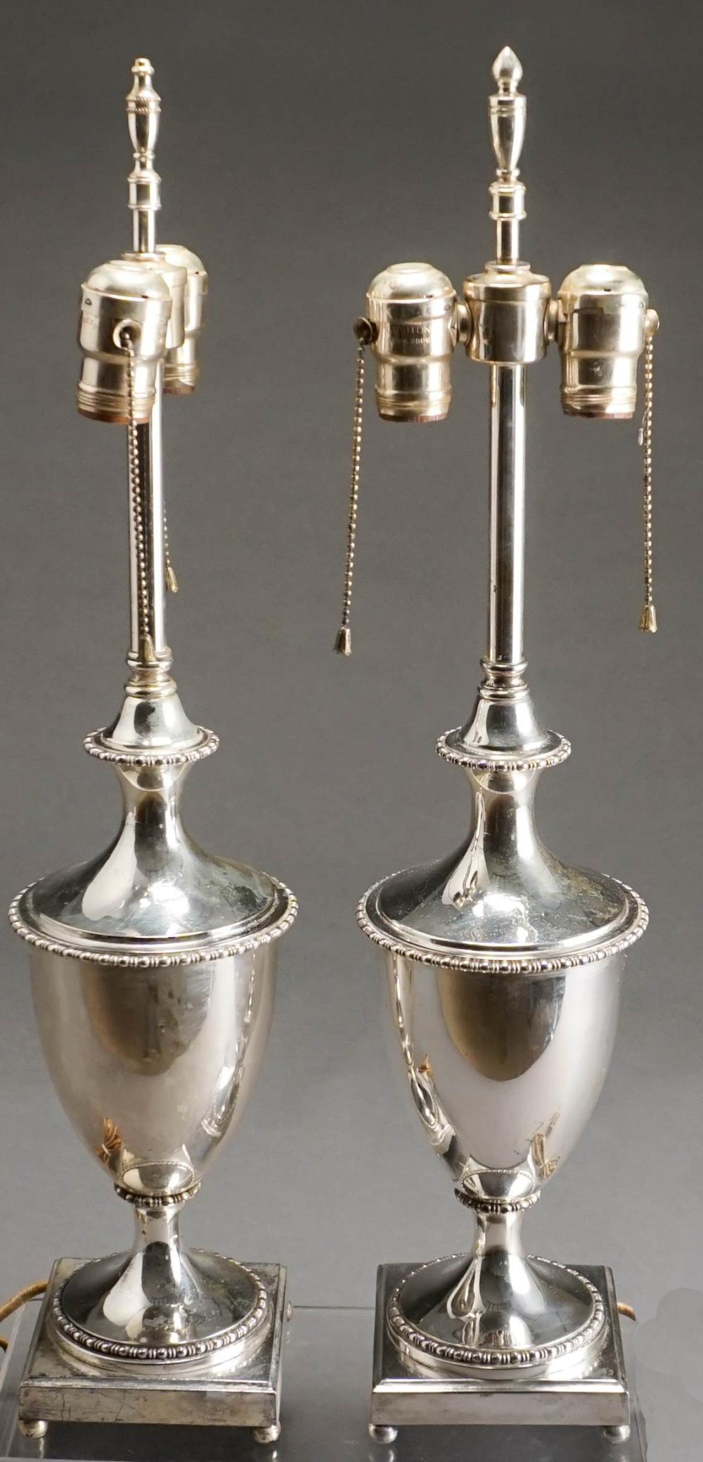 PAIR OF SILVER PLATE URNS MOUNTED 32a404