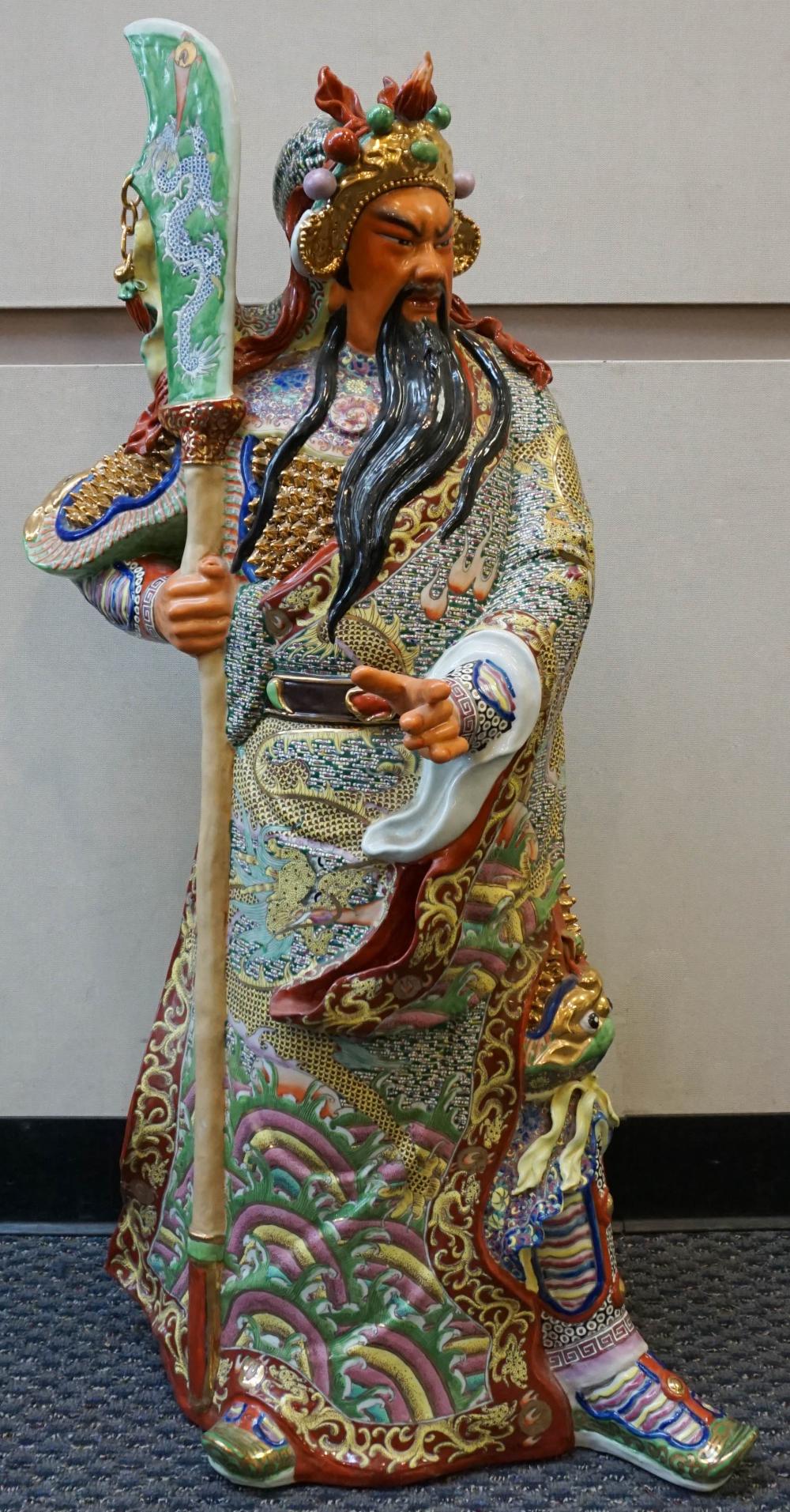 CHINESE POLYCHROME DECORATED FIGURE
