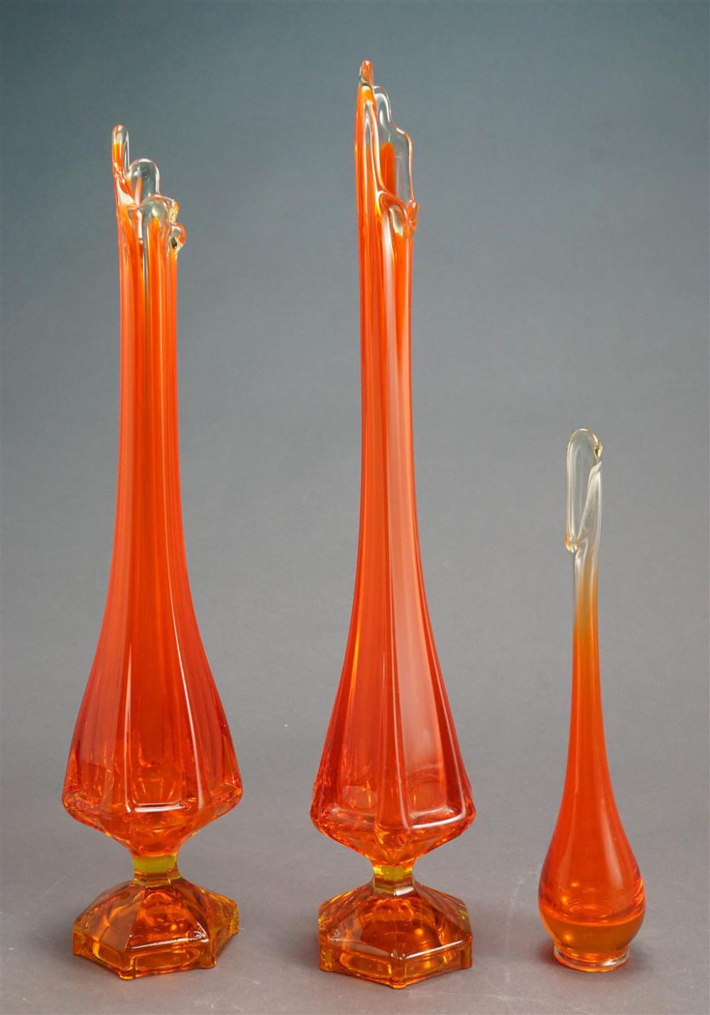 THREE ORANGE ART GLASS VASESThree 328260