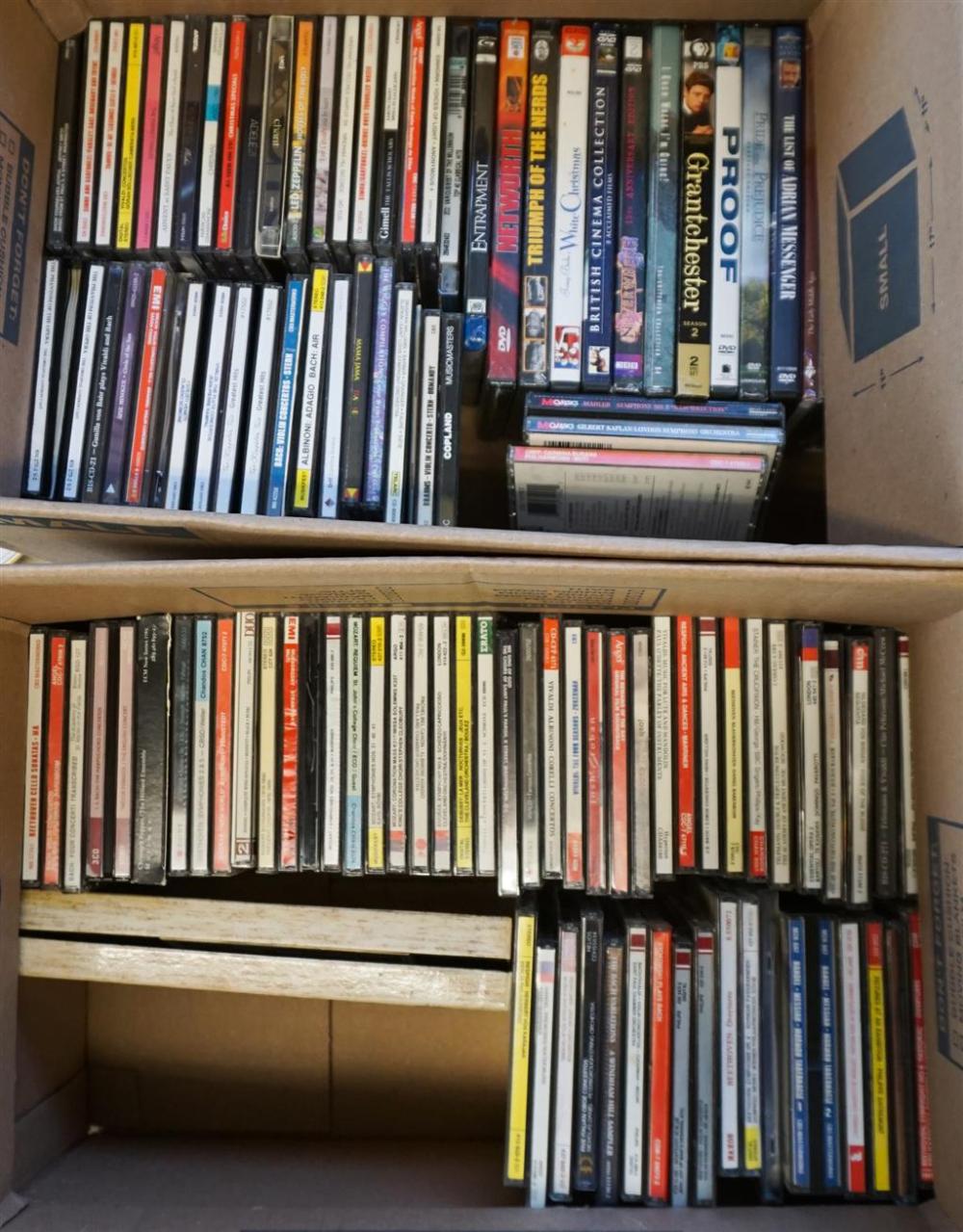 TWO BOXES OF CD S AND DVD STwo 3282b0