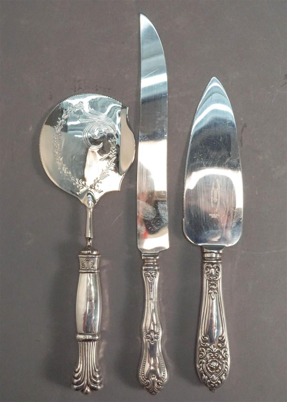 THREE STERLING SILVER HANDLE PASTRY
