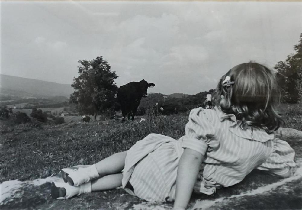 YOUNG GIRL RECLINING IN PASTURE, PHOTOGRAPH,
