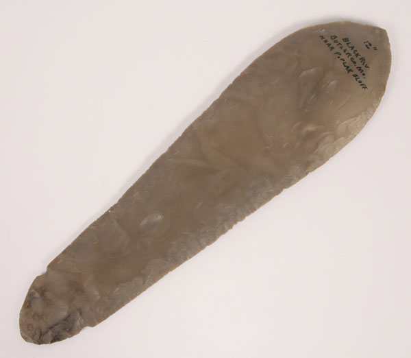 Exceptional notched Ramey knife; found