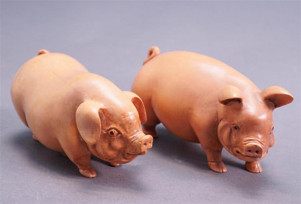 TWO CARVED WOOD FIGURES OF PIGS, H: