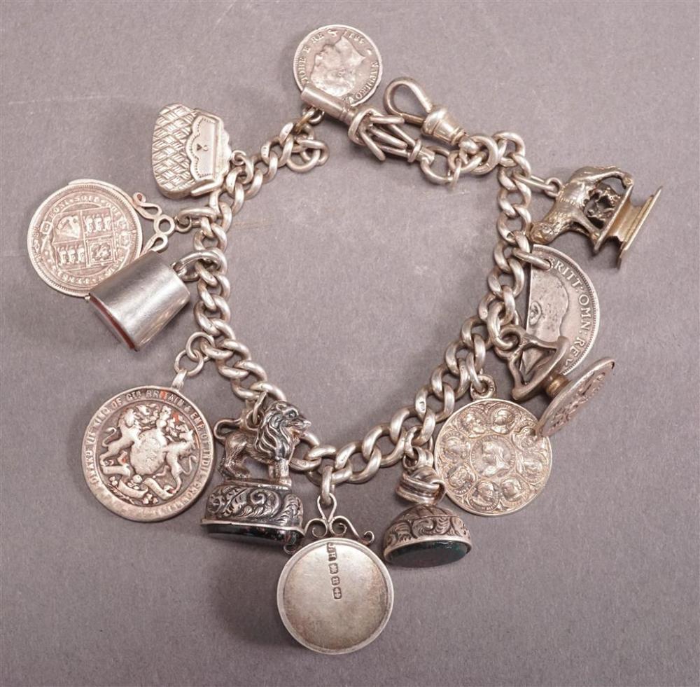 SILVER CHARM BRACELET WITH 13 ASSORTED 328c28