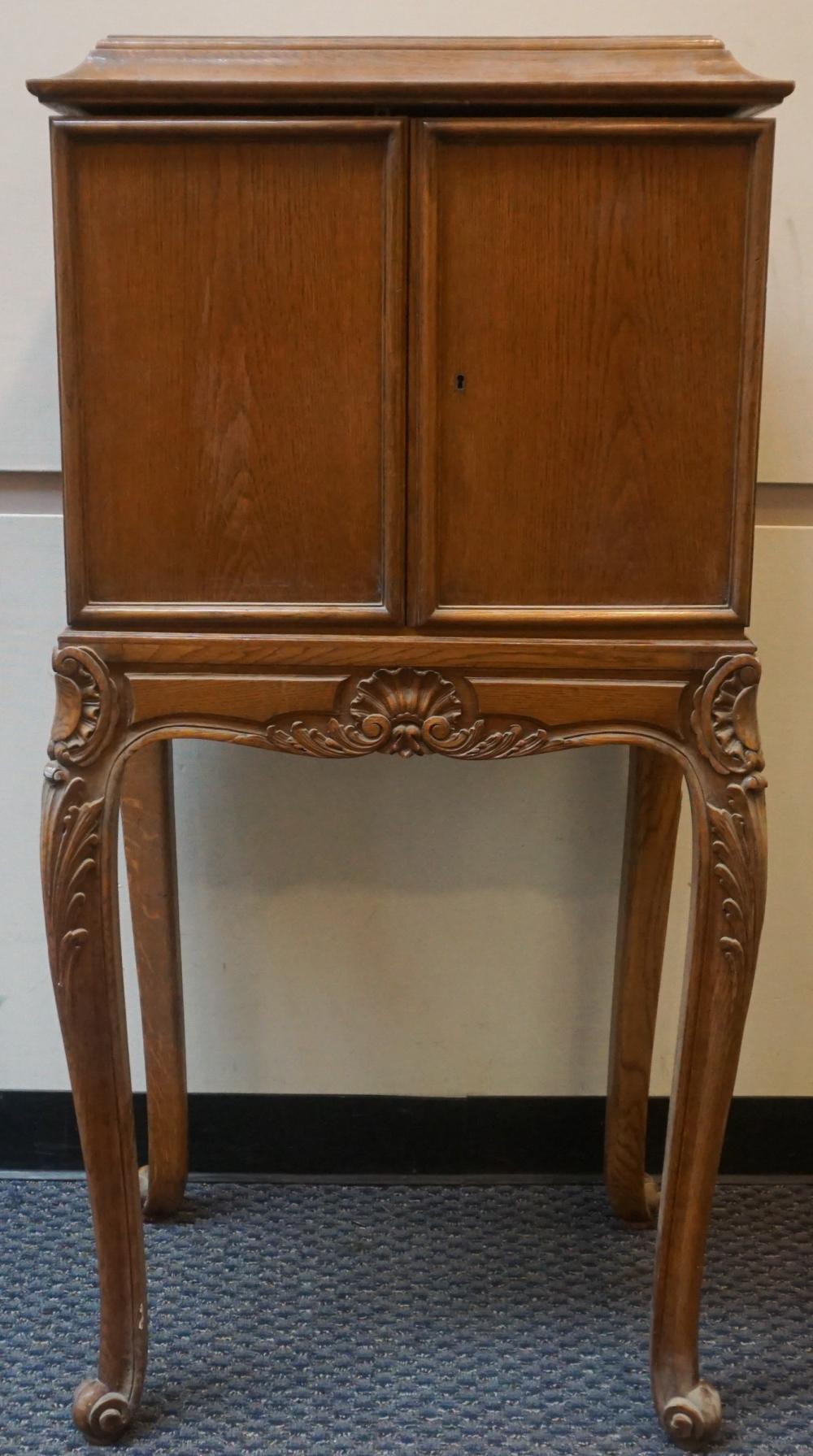 LOUIS XV STYLE OAK HINGED-TOP TWO-DOOR