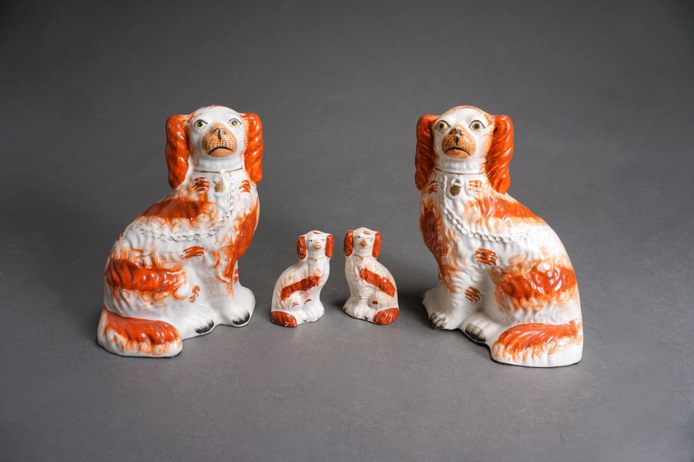 TWO PAIRS OF STAFFORDSHIRE SPANIELS,