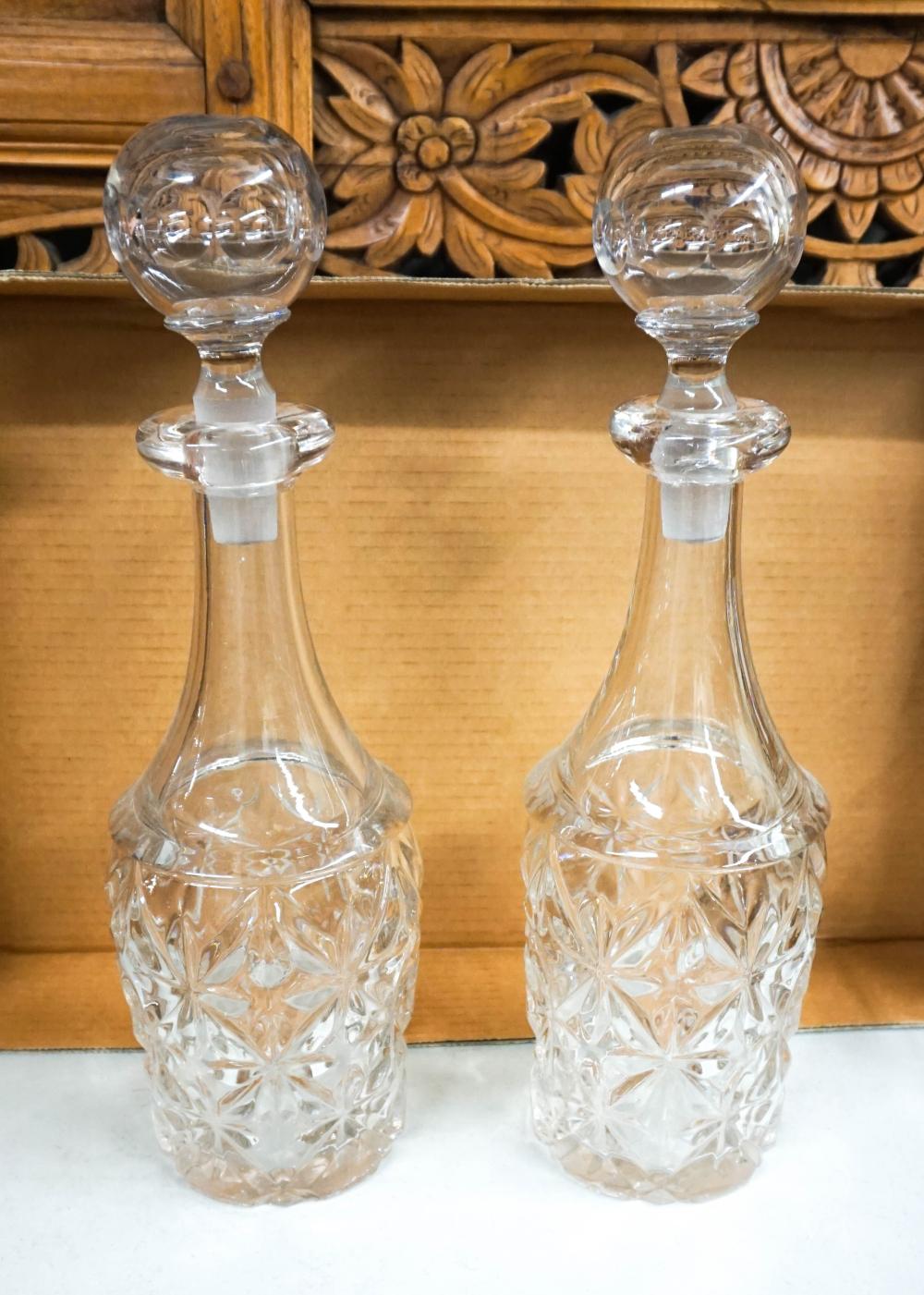 PAIR OF MOLDED GLASS DECANTERSPair