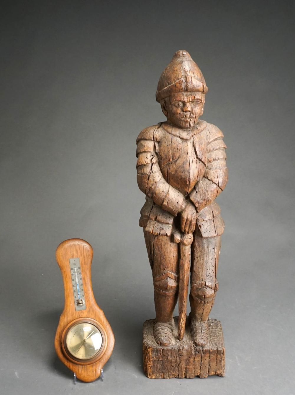 CARVED WALNUT FIGURE OF AN EXPLORER