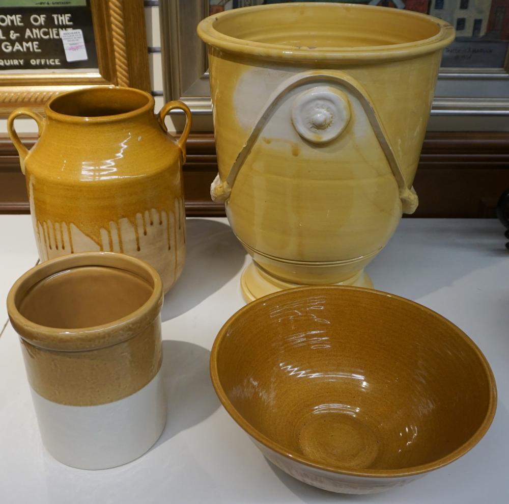 FOUR OCHRE-YELLOW GLAZED CERAMIC