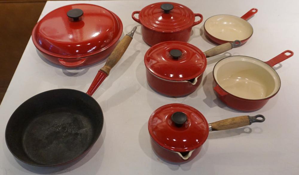 SEVEN RED LE CREUSET CAST IRON