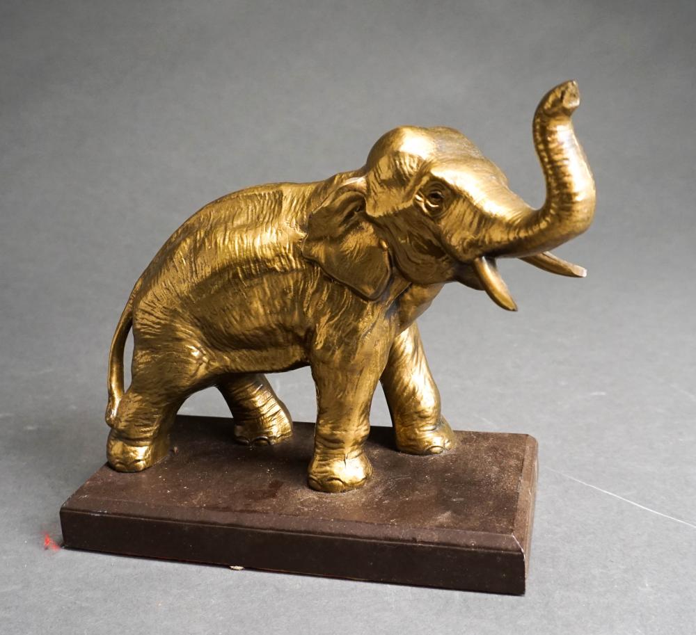 BRASS STATUE OF AN ELEPHANT, H: 8 IN.